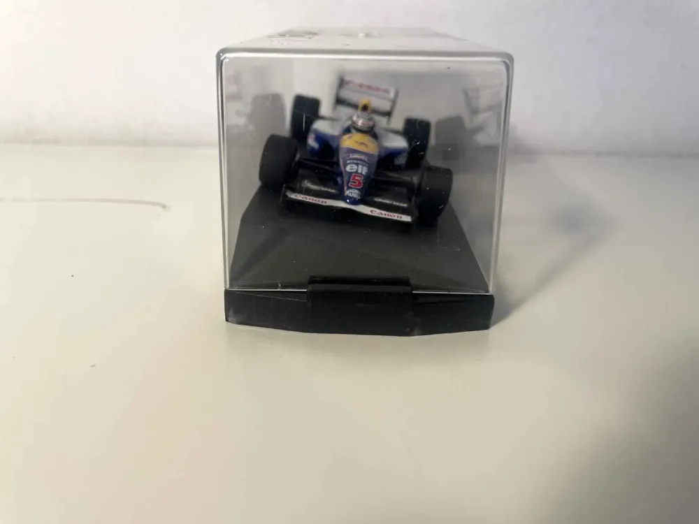 Auto di Formula 1 blu, bianca e gialla numero 5 (scatola rettangolare) collezione ONYX