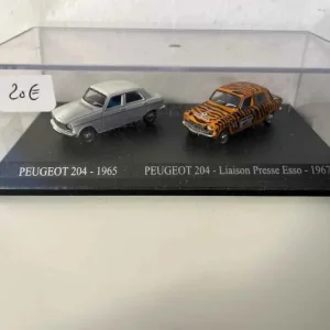Comunicato stampa ESSO (scala HO) della Peugeot 204 bianca del 1965 + Peugeot 204 arancione con strisce nere