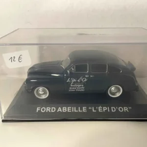 Ford Bee grigio scuro con pubblicità L'EPI D'OR