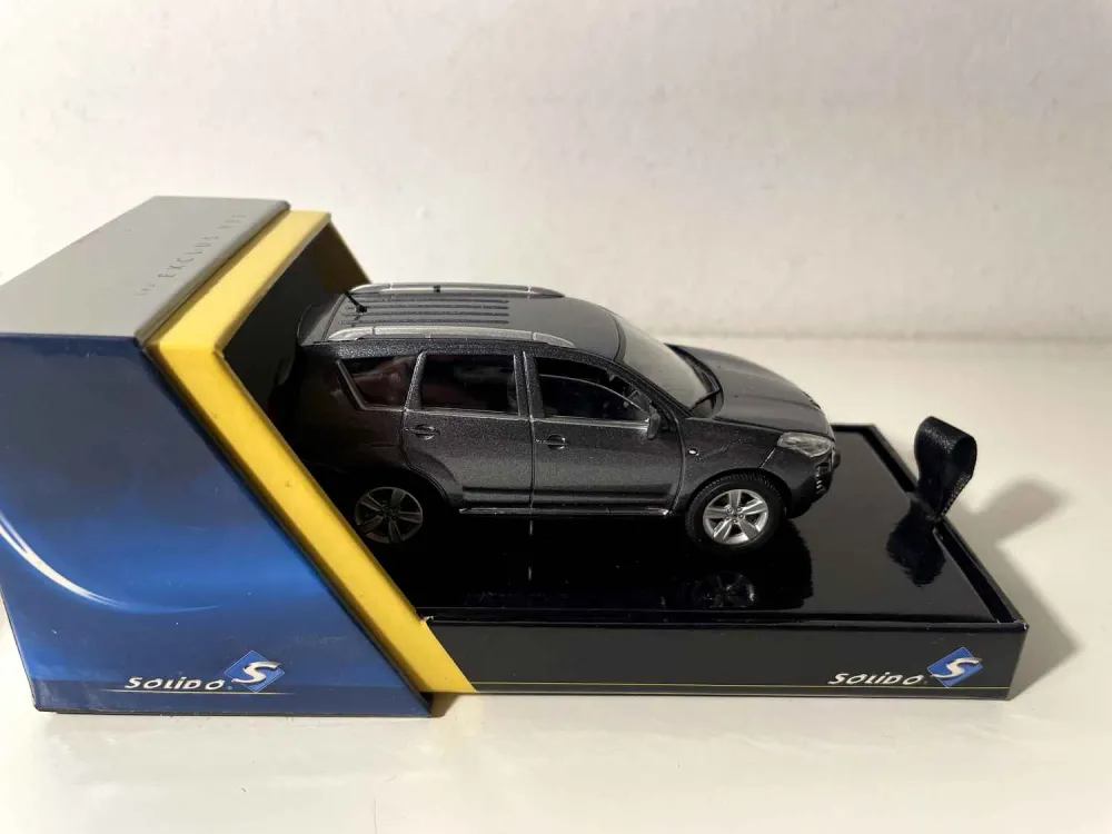 Peugeot 4007 grigio (riferimento Solido 151 388-00) Scatola di cartone