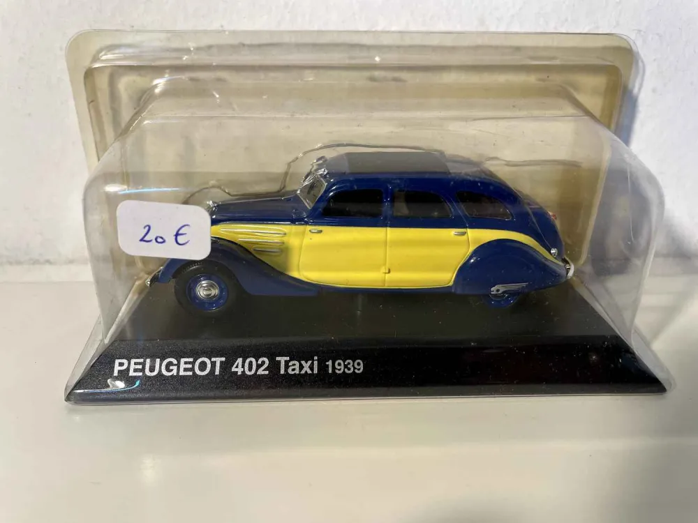 Peugeot 402 TAXI gialla e blu del 1939