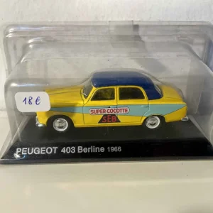 Peugeot 403 berlina gialla con tetto blu del 1966 (pubblicità SUPER COCOTTE)