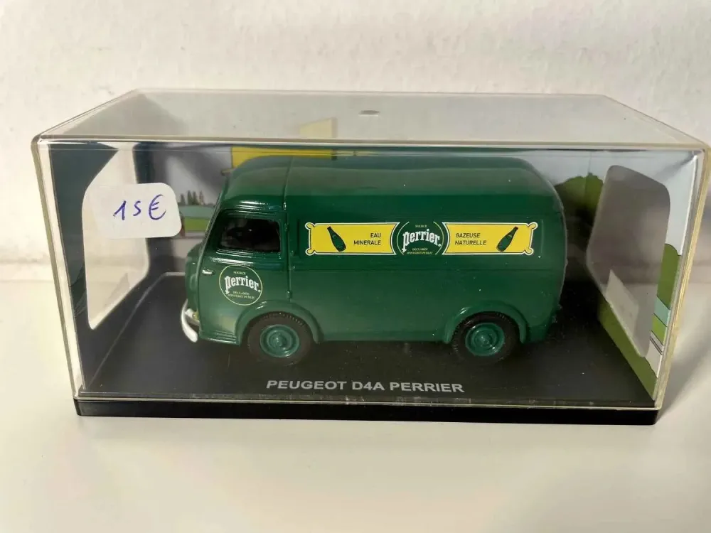 Peugeot D4A verde con pubblicità PERRIER